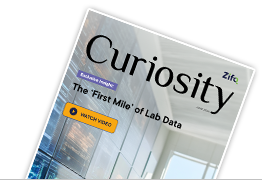 Curiosity July Cover Menu | Zifo Magazine cover titled Curiosity with the subtitle 'The First Mile of Lab Data', tilted against a black background.